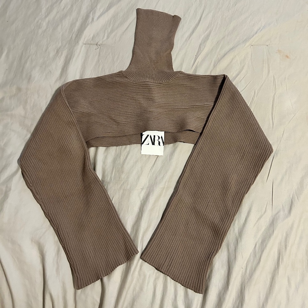 Zara arm shrug